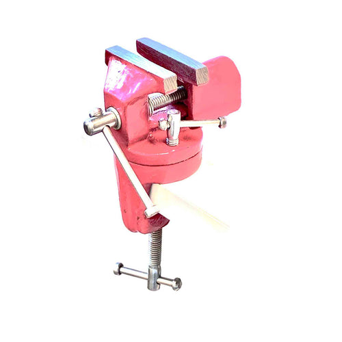 Mini-Tischschraubstock 60 mm in Rot mit 360 Grad Drehfunktion an einer Tischplatte befestigt